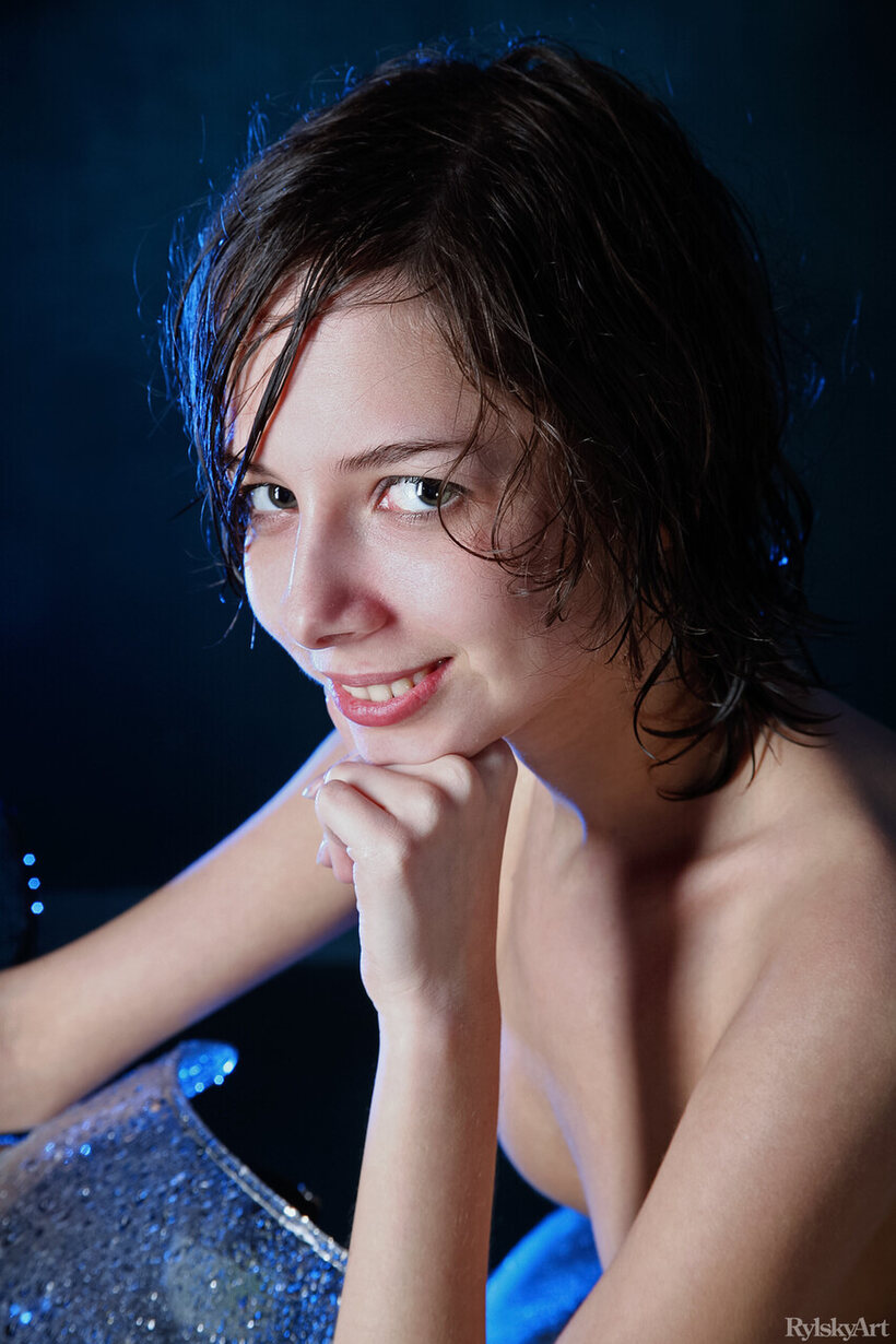 Amateur pic 7 from the set «Freckled teen models naked in the rain atop a motorcycle»