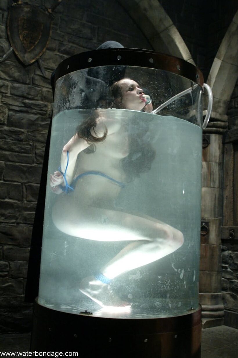 Maya Matthews nude photo 6 — Bound and soaked, Maya Matthews survives a rough BDSM drowning scene