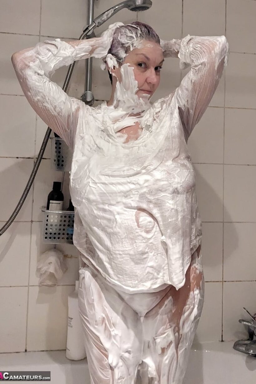 Image 10/16: Layla Bird coats herself in shaving cream in the shower