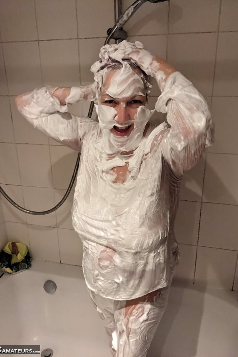 Image 11/16: Layla Bird coats herself in shaving cream in the shower