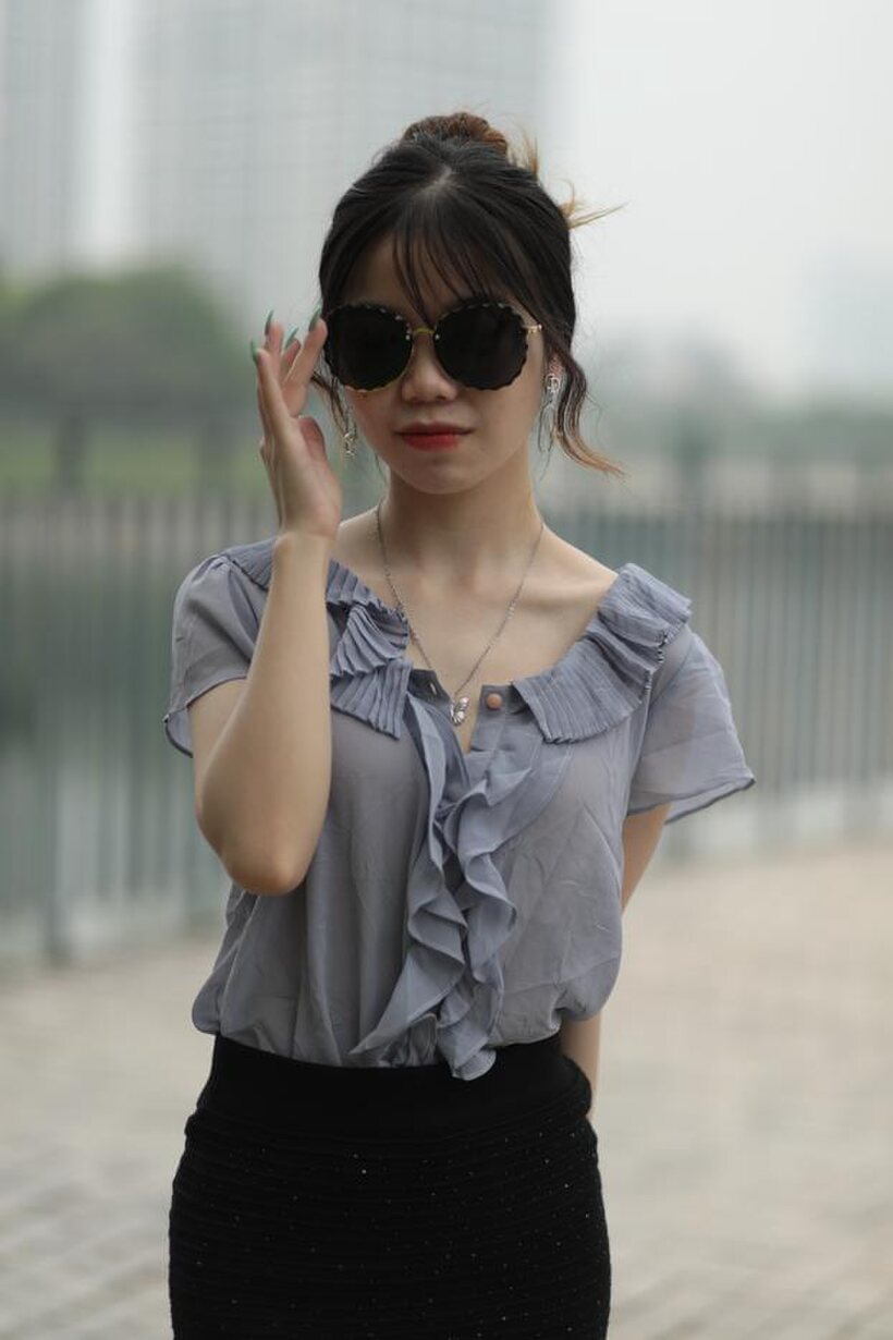 Photo 11 — Asian teen teases in non-nude bridge poses wearing shades
