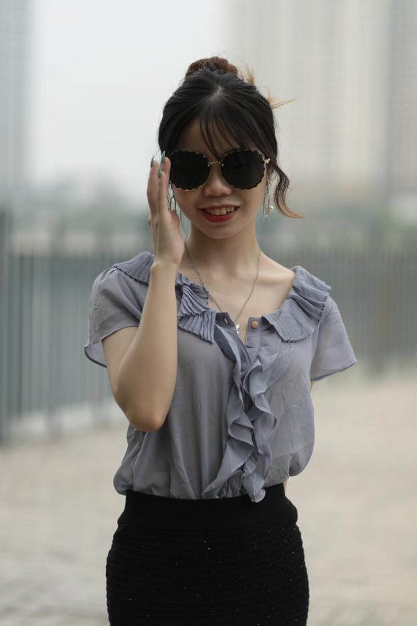 Asian teen teases in non-nude bridge poses wearing shades (shot 13)
