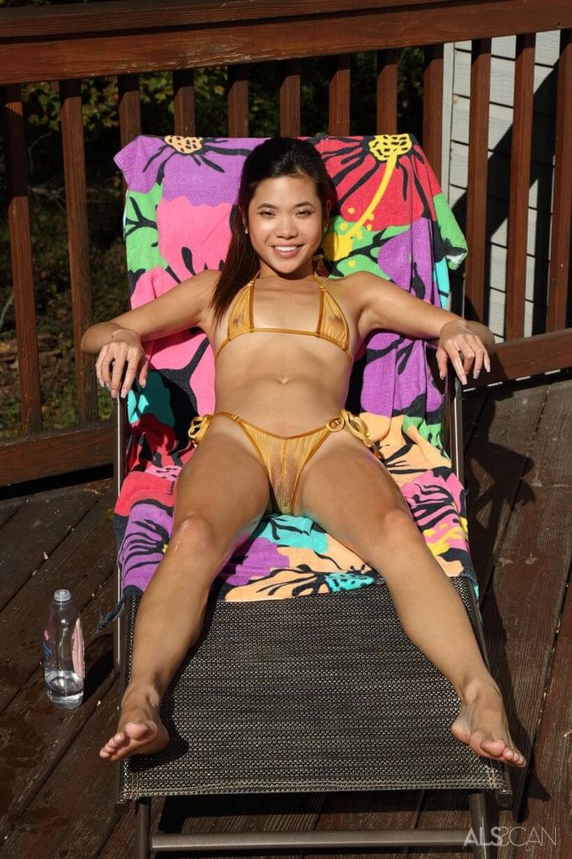 Image 4/16: Vina Skyy slips off her bikini and toys her pussy on the deck