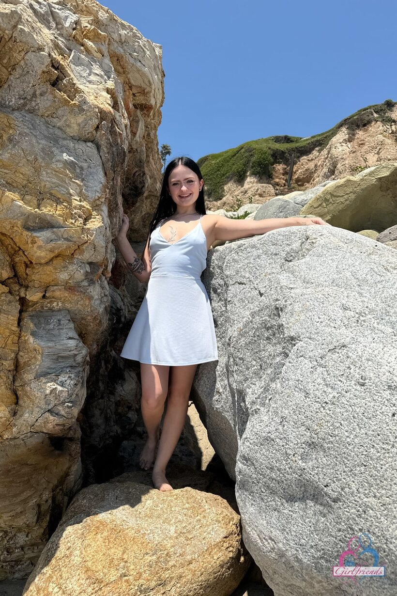 Photo 15 — Imani Valor steps from the car and spreads her pussy lips