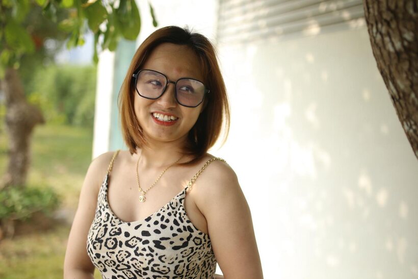 Photo 12 — Eyeglasses and leopard dress frame this sweet Asian babe outdoors