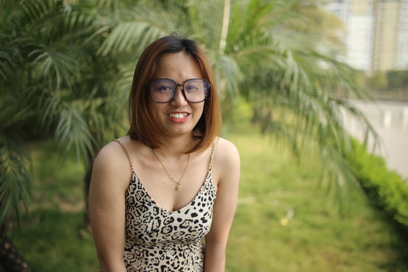 Eyeglasses and leopard dress frame this sweet Asian babe outdoors, photo 21 of 21