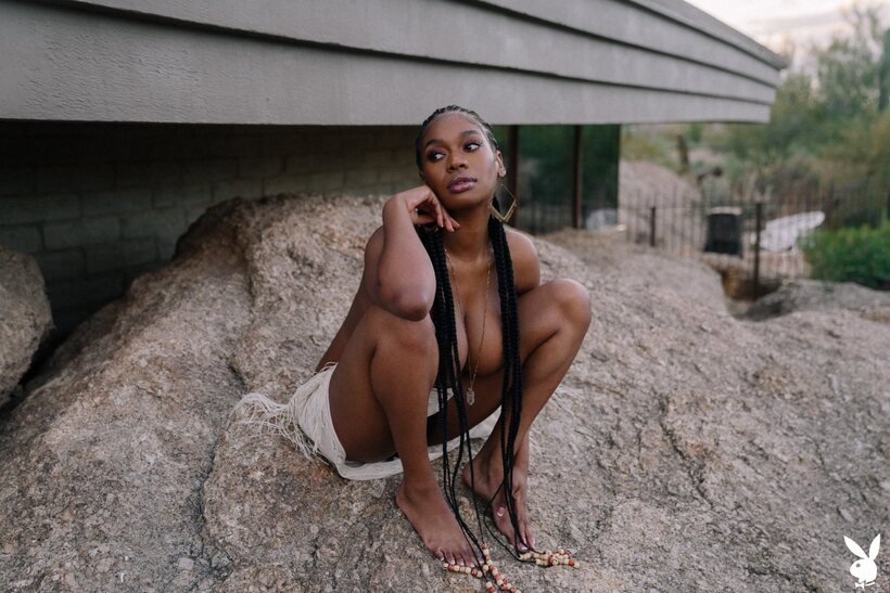 African nude photo 11 — Ebony girl undresses and shows her big tits and hairy pussy outdoors