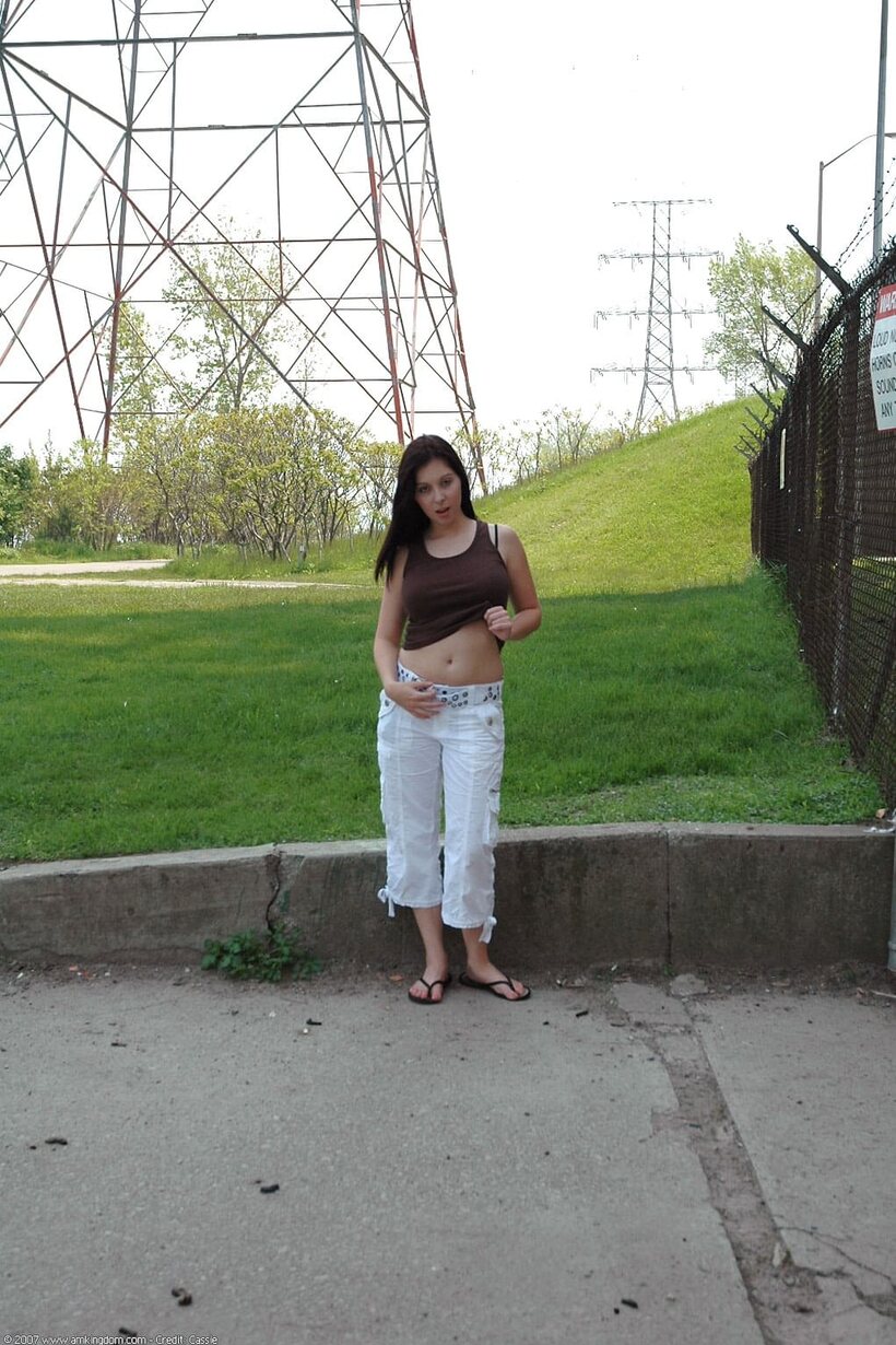 Barefoot by the water, young amateur shows off her pussy and tits (shot 4)