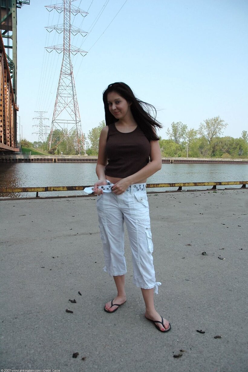 Barefoot by the water, young amateur shows off her pussy and tits (shot 5)