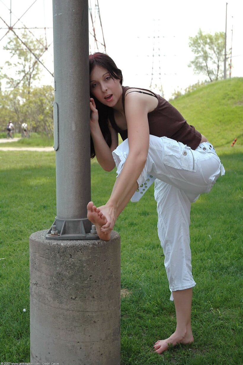 Barefoot by the water, young amateur shows off her pussy and tits, photo 10 of 21