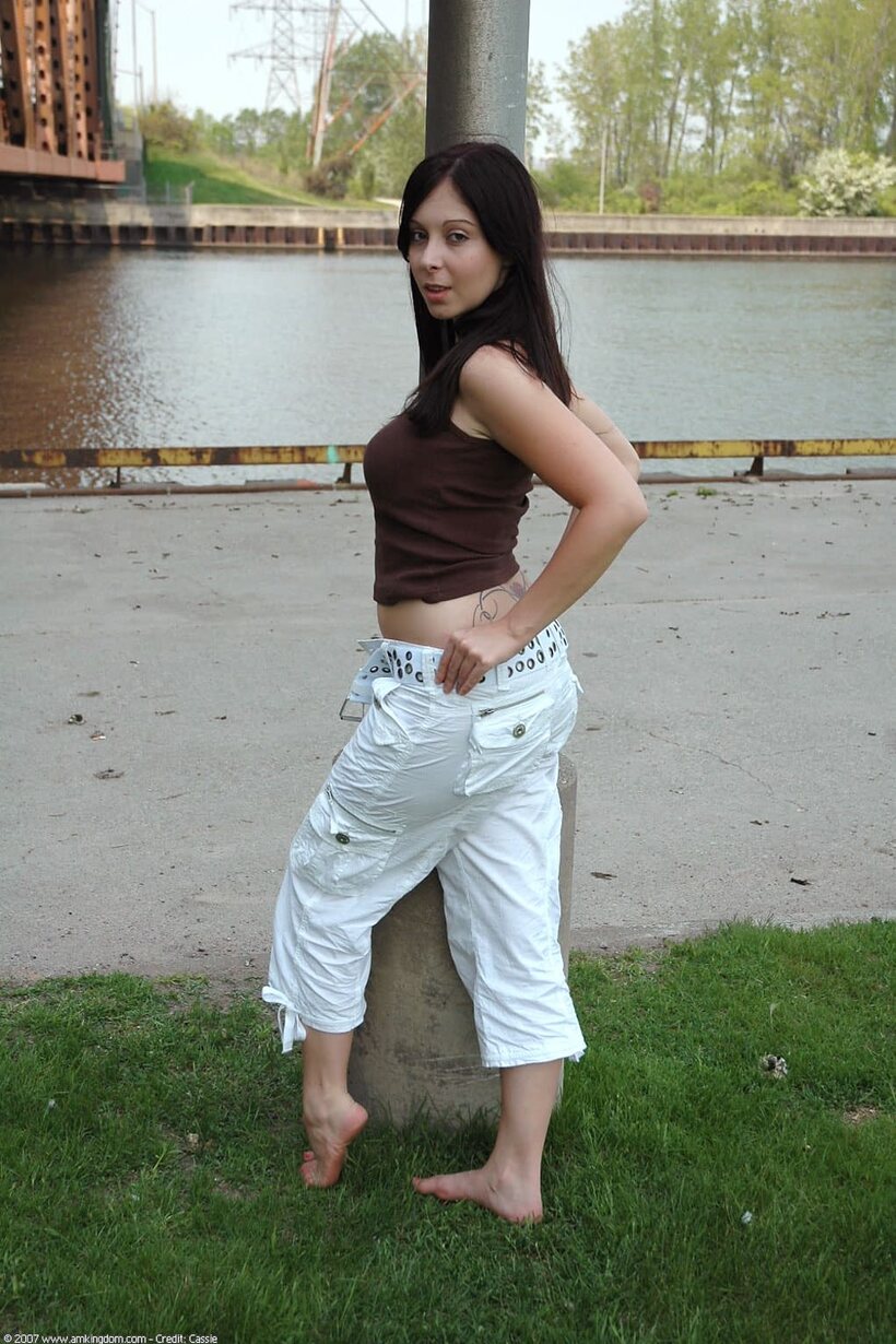 Amateur pic 13 from the set «Barefoot by the water, young amateur shows off her pussy and tits»
