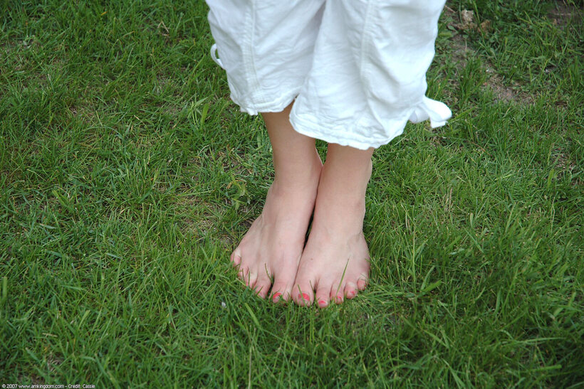 Barefoot by the water, young amateur shows off her pussy and tits (shot 15)