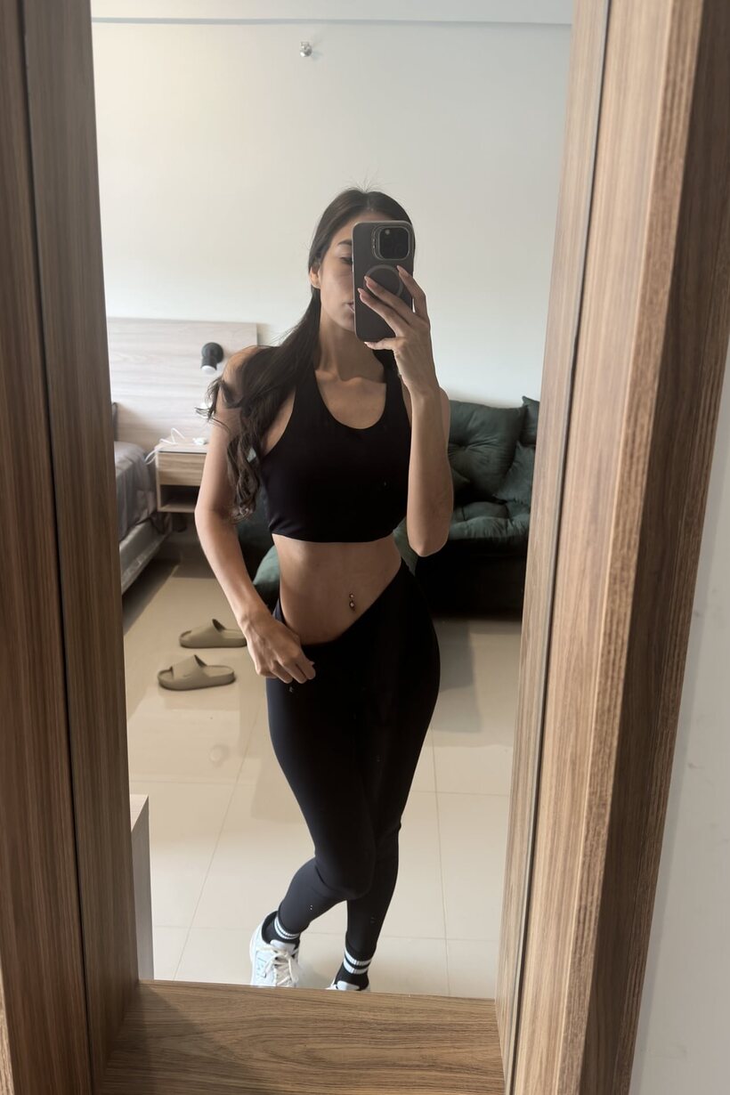 Amateur nude photo 3 — Skinny girl takes selfies and shows her ass in front of the mirror
