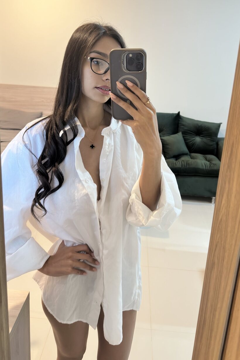 Photo 9 — Skinny girl takes selfies and shows her ass in front of the mirror