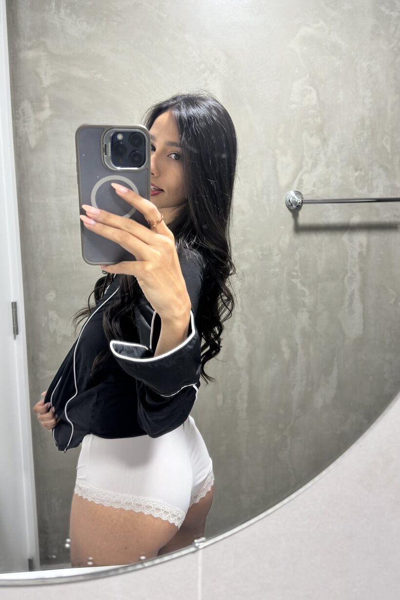 Image 14/16: Skinny girl takes selfies and shows her ass in front of the mirror