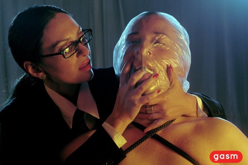 In glasses, German MILF Lady Empress smokes and teases a guy (shot 9)