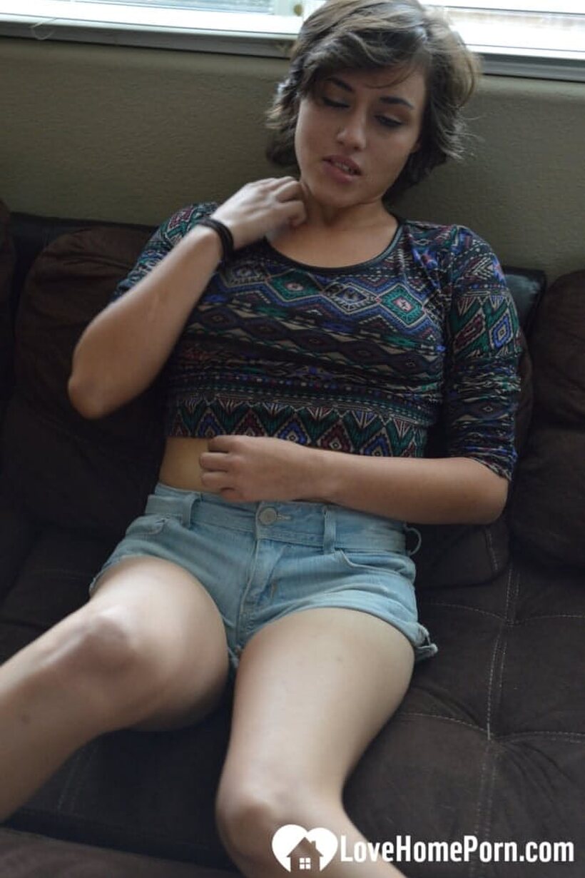 Pretty girl exposes her tiny tits while playing with a dildo (shot 3)