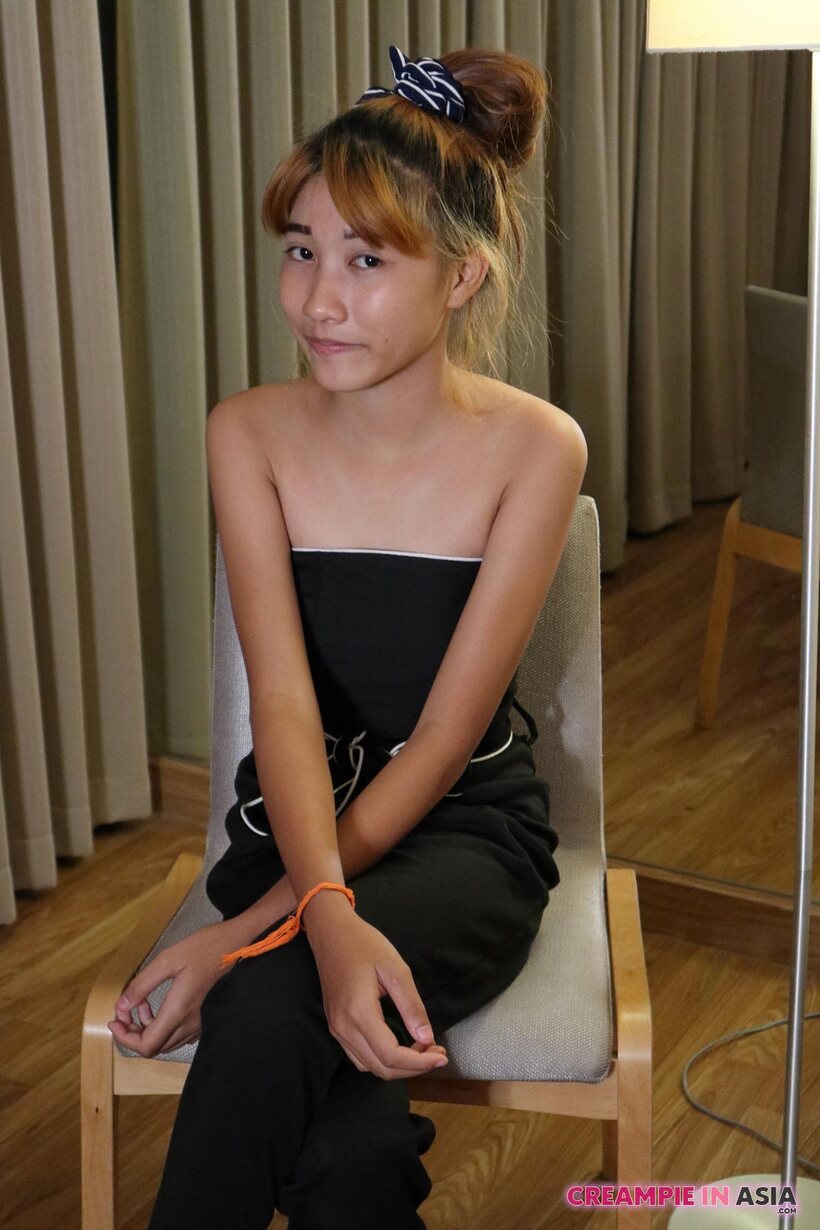 Photo 1 — Clothed girl plays with a girlfriend and shows her tiny tits and asshole in lingerie