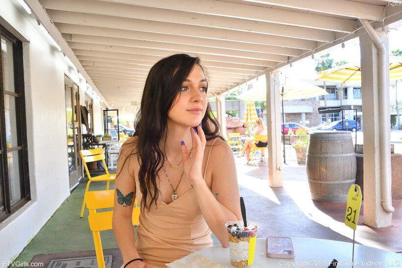 Photo 21 — Clothed girl flaunts her legs while flashing