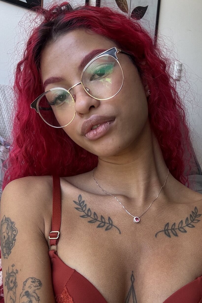 Cute girl exposes her natural tits (shot 8)
