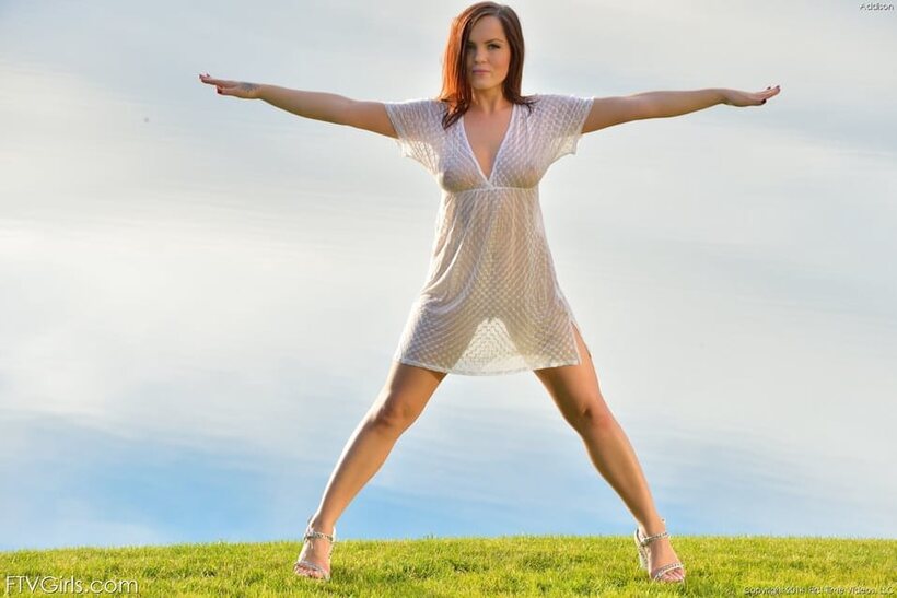 Aubrey Addison flashes nude under her dress outdoors in heels, photo 10 of 15