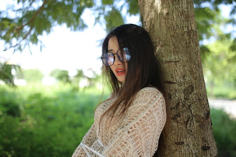 Posing in a cute outfit outdoors, Elena shows off her glasses and Asian charm, photo 5 of 21
