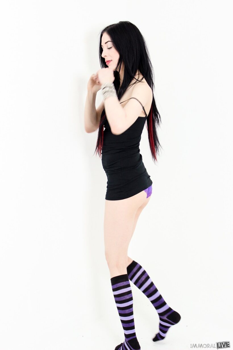 Aiden Ashley nude photo 3 — Aiden Ashley shows off her tiny ass in striped socks and skirt