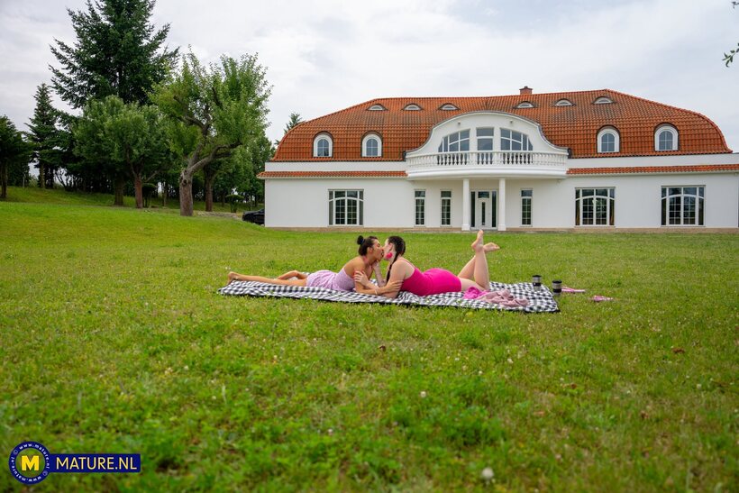 Photo 2 — Emily Devine enjoys outdoor fun with a lesbian pair