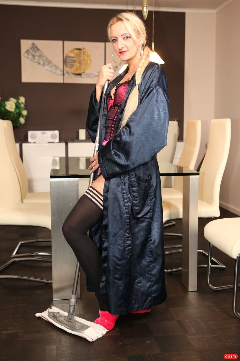 Adrienne Kiss pic 11 from the set «Adrienne Kiss flirts in lingerie while handling housework around the home»