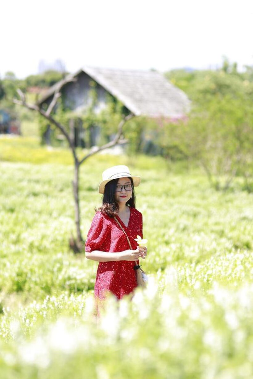Amateur nude photo 15 — Glasses on, an Asian babe poses outdoors in a red dress