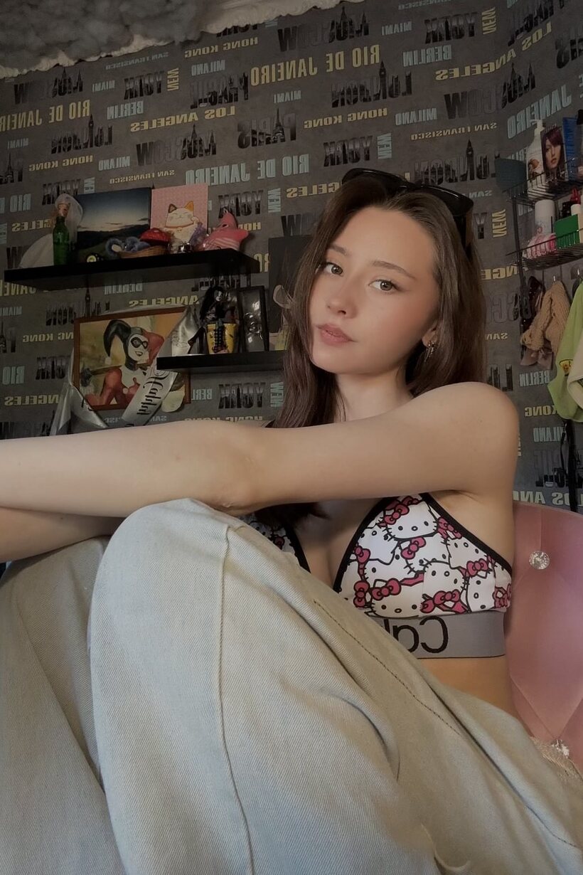 Photo 4 — Schoolgirl taking selfies outdoors