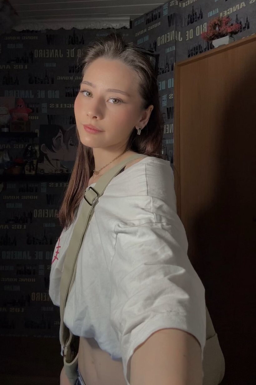 Photo 14 — Schoolgirl taking selfies outdoors