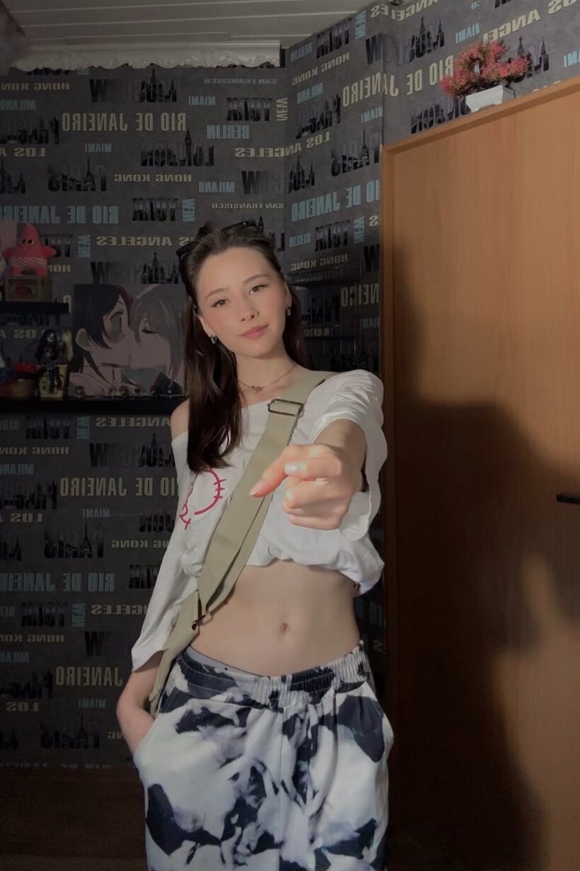Schoolgirl taking selfies outdoors (shot 17)