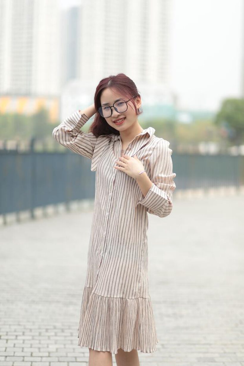 Photo 5 — Beautiful girl in a dress shows her body in public
