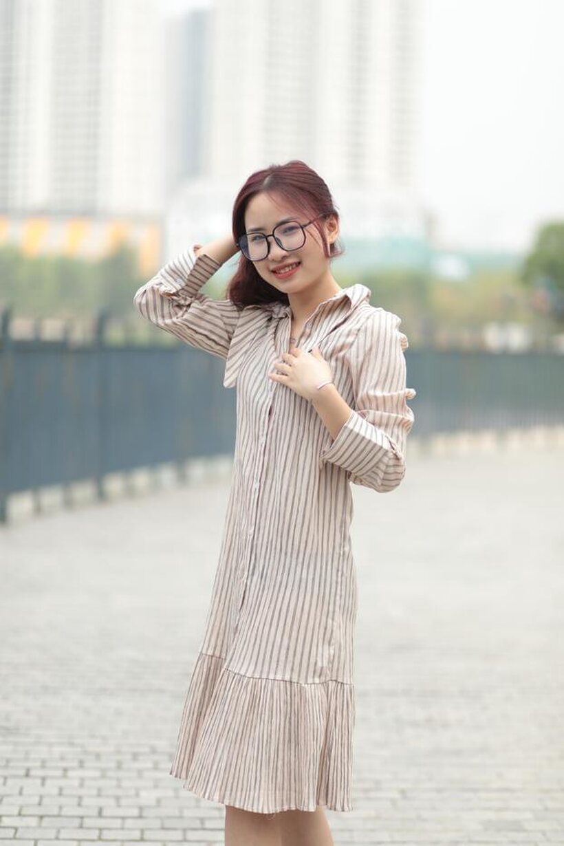 Photo 6 — Beautiful girl in a dress shows her body in public