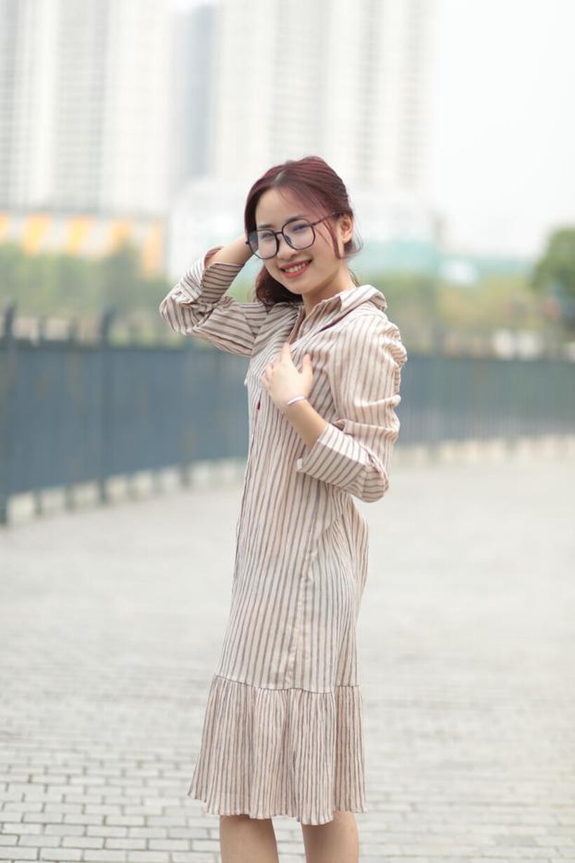Photo 7 — Beautiful girl in a dress shows her body in public