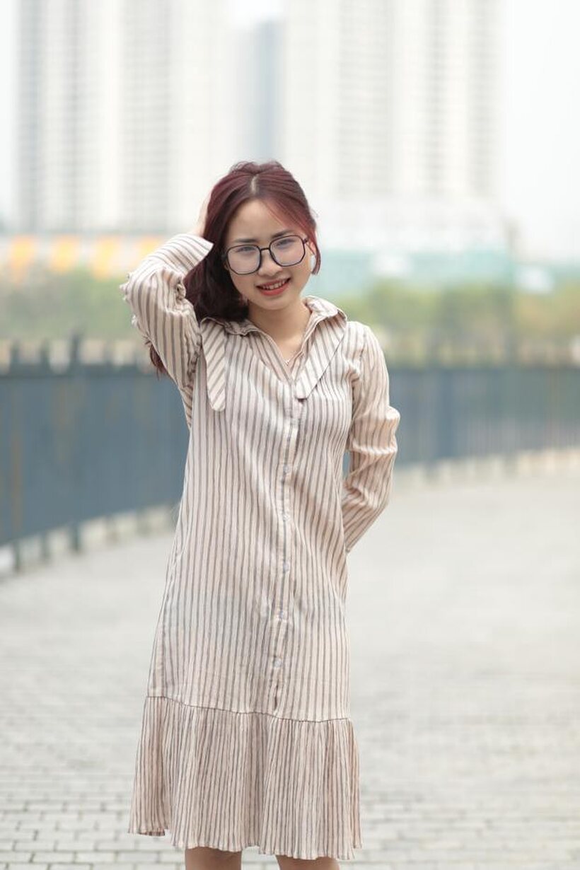 Beautiful girl in a dress shows her body in public, photo 21 of 21