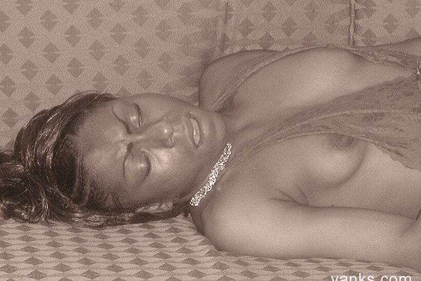 Image 16/17: Colette plays with a ribbed dildo, showing off her small tits and pussy