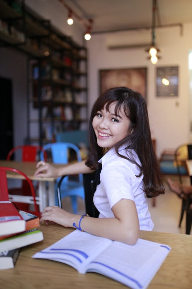 Image 3/21: Asian girl strips out of her skirt and poses naked