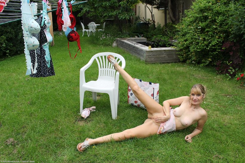 Amateur nude photo 19 — Jane B slips out of her dress and spreads her love hole