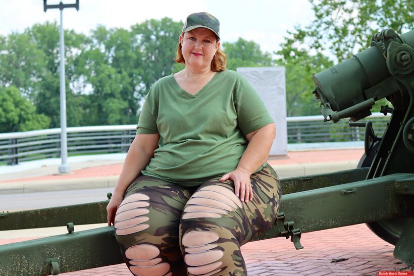 Obese amateur Goddess Pear poses in camo on artillery gun, photo 1 of 12