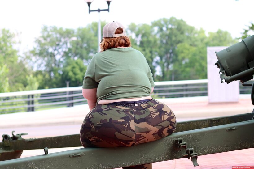 Photo 4 — Obese amateur Goddess Pear poses in camo on artillery gun