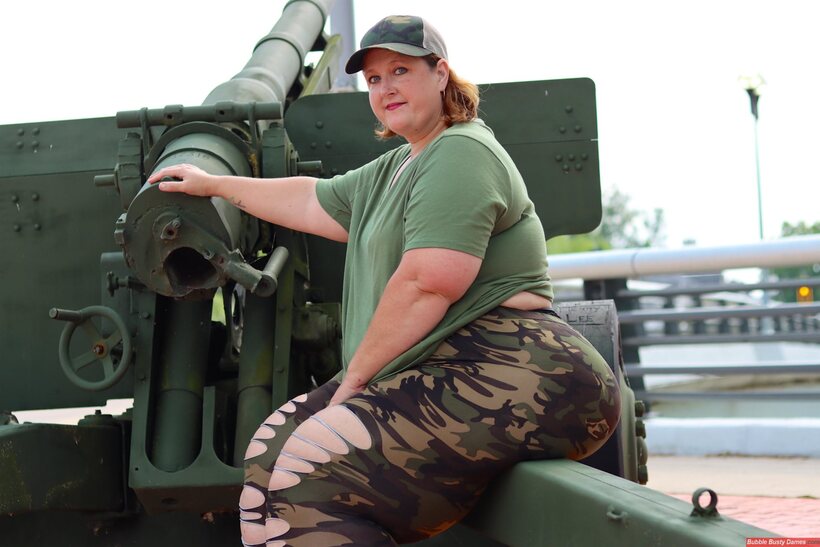 Photo 5 — Obese amateur Goddess Pear poses in camo on artillery gun