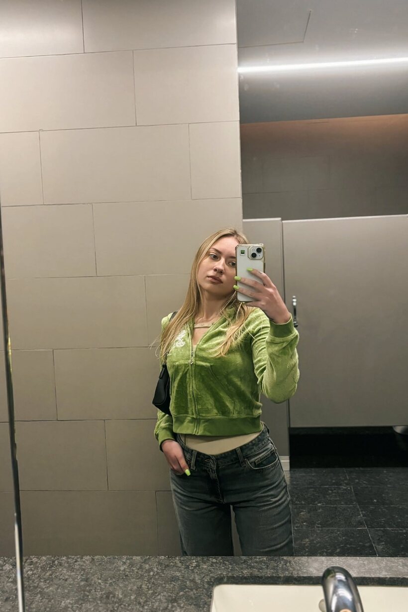 Photo 12 — Blonde amateur snaps selfies all day while showing off her curves