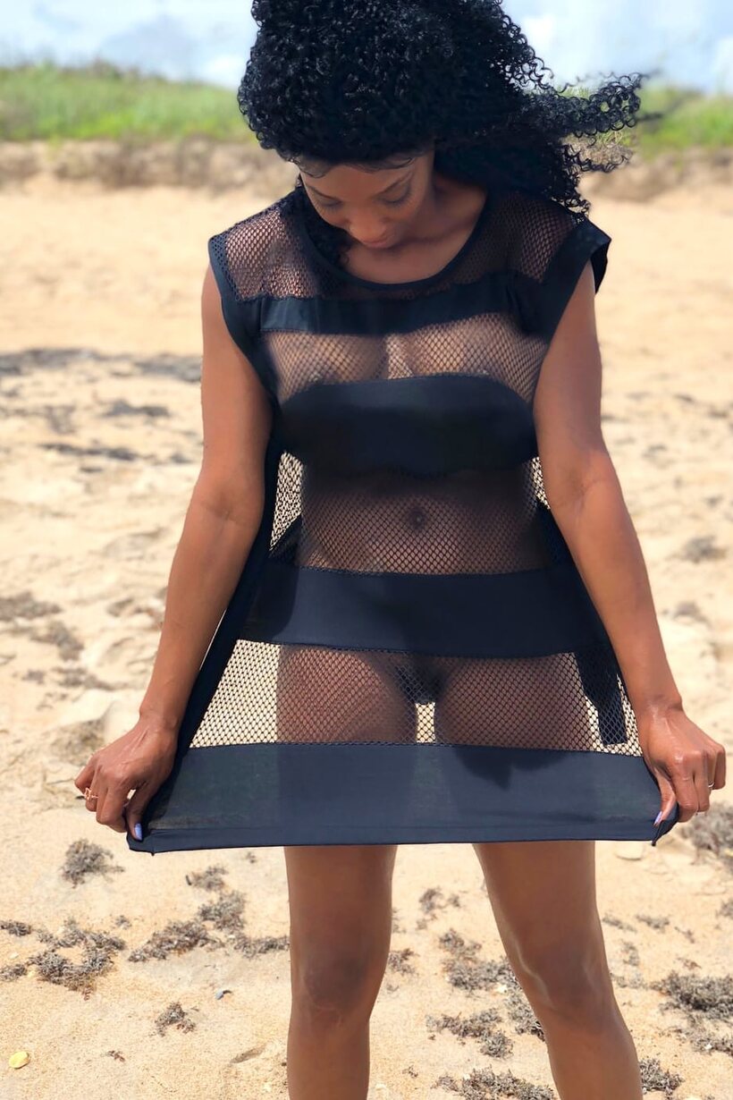 African pic 7 from the set «Flaunting her big tits, this hot ebony babe models sexy lingerie»