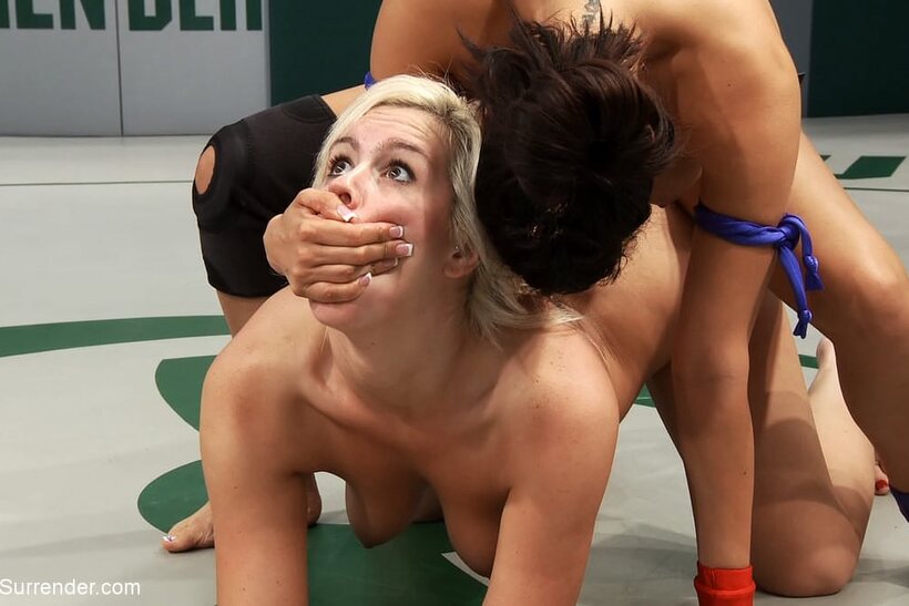 Bound blonde gets dildoed by Isis Love and her lesbian girlfriend (shot 7)