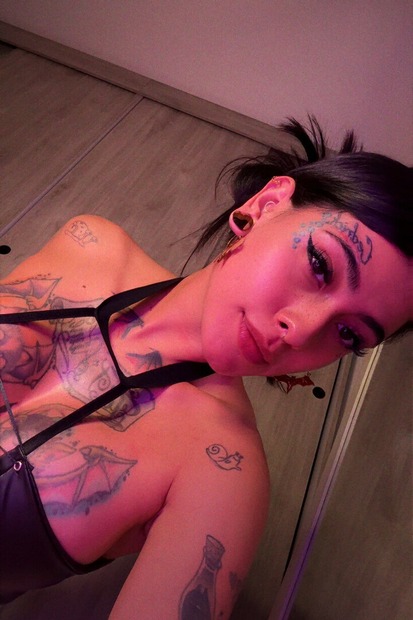 Goth tattooed babe poses in sexy lingerie for a solo shoot (shot 12)