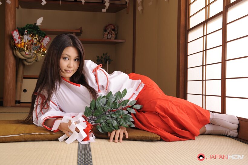 Brunette Airi Ai poses with her big tits on display, photo 5 of 15