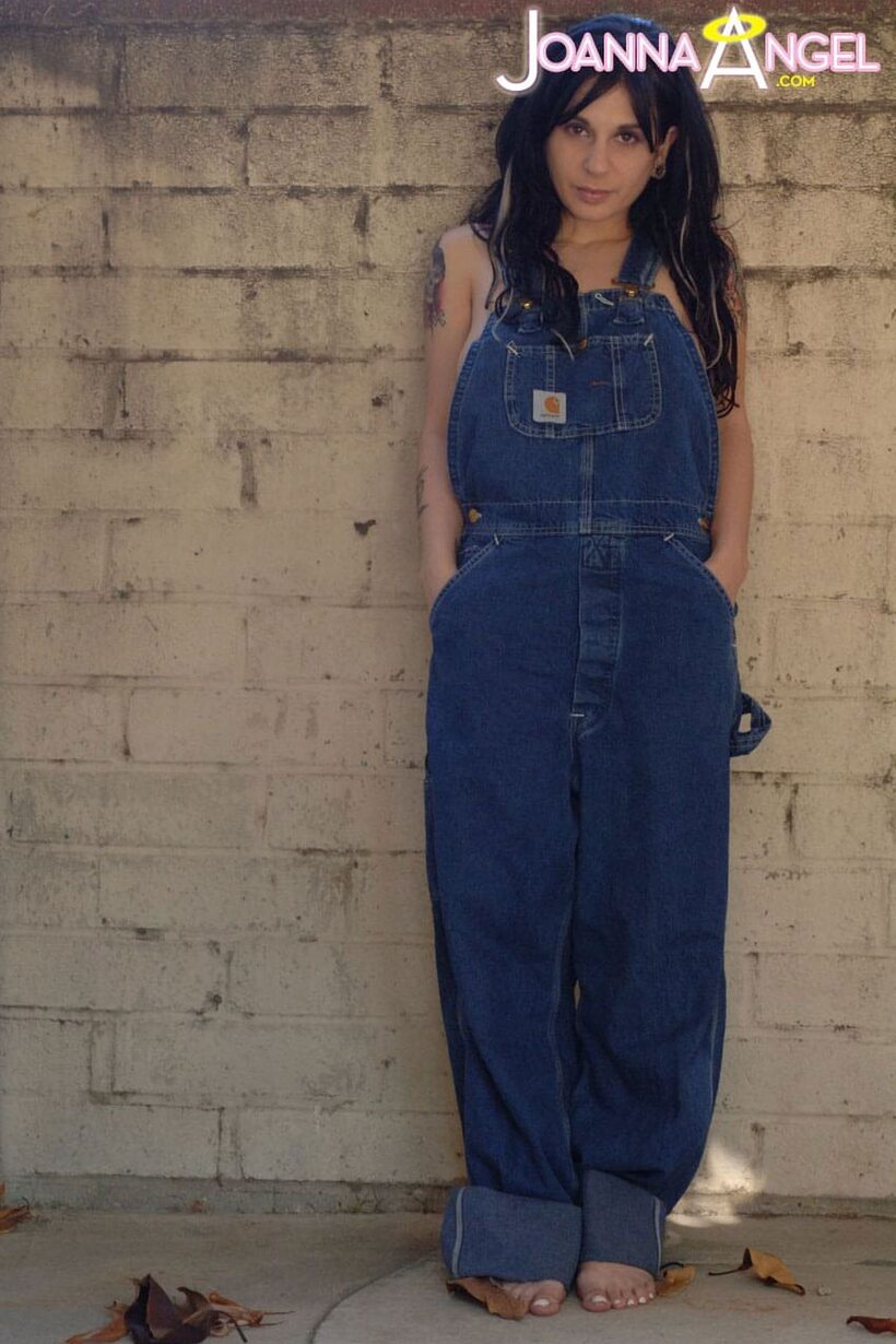Photo 1 — Joanna Angel lets her boobs spill from overalls before stripping