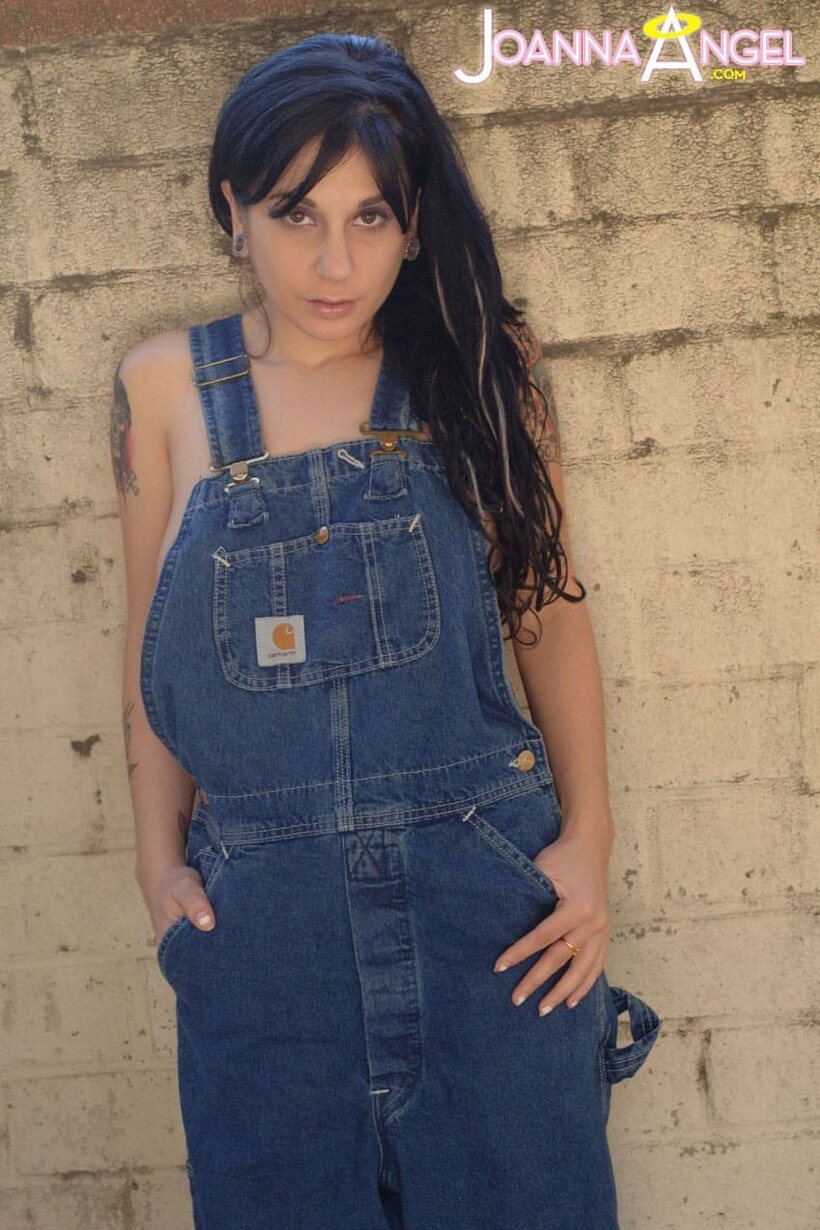 Joanna Angel lets her boobs spill from overalls before stripping (shot 2)